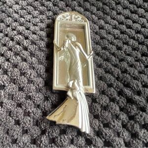 Art Deco woman in the looking glass iconic pin